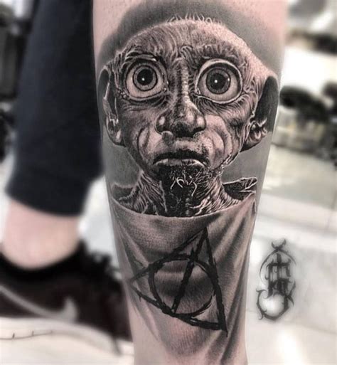 Realistic Dobby Tattoo From Harry Potter Movies Done By Our Artist