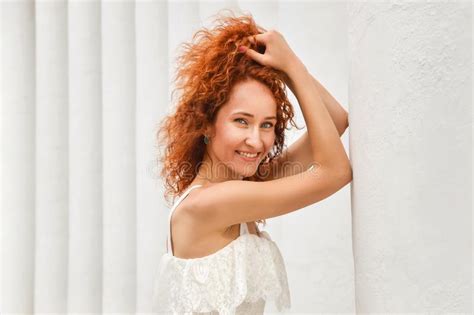 Close Up Macro Beautiful Red Haired Girl Laughs And Straightens Curly