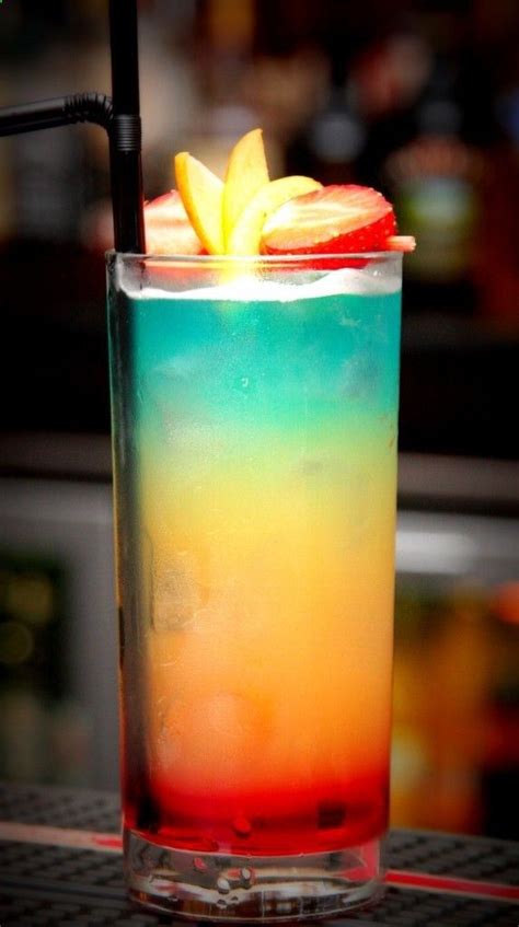 Paradise Light Rum Malibu Rum Blue Curacao Pineapple Juice And Grenadine Paradise Cocktail
