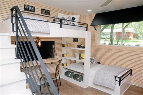 Some bunk bed designs place the larger mattress on top, with the lower twin mattress placed perpendicular to the upper full mattress to provide proper balance for the frame. Skinnylap Boy's Bedroom With Perpendicular White Bunk Beds | HGTV