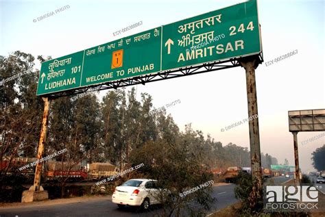 Welcome Signboard Of Punjab On Highway Showing Direction Towards