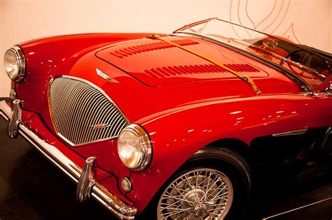 A storied, colorfully documented history of ownership, club rallies and concours. 1956 Austin Healey 100m Photograph by David Patterson