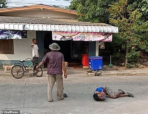 Two Drunk Thai Men Fall Over As They Try To Fight Each Other Daily