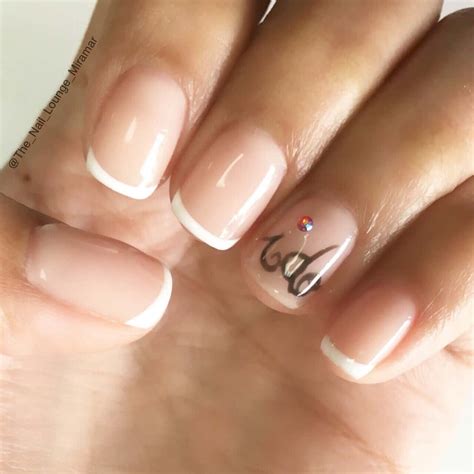 The good thing about white nails is that they go with any nail art and here is a beautiful example. 15 Wedding Nail Designs For the Bride-To-Be
