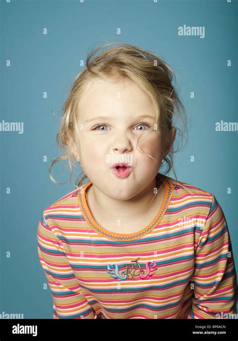 Portrait Of Little Girl Making A Face Stock Photo Alamy