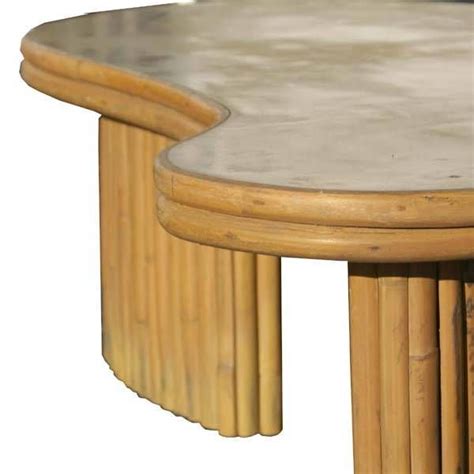 Metal coffee table with antique detailing for storage and display. Vintage Kidney Shaped Bamboo Coffee Table at 1stdibs