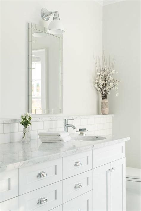 Then, figure out the best way to start that pattern. White Bathroom with Marble Backsplash Ledge - Transitional ...