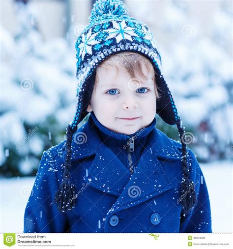 This reviewer rated product 5 out of 5 stars. Portrait Of Little Toddler Boy In Winter Clothes With ...