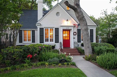 White Cottage With Shutters And Red Front Door Via Zillow Cottage