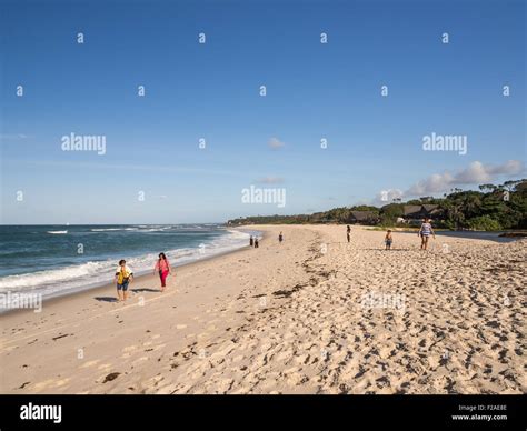 People Walking On The Kutani Beach In Dar Es Salaam Tanzania On A