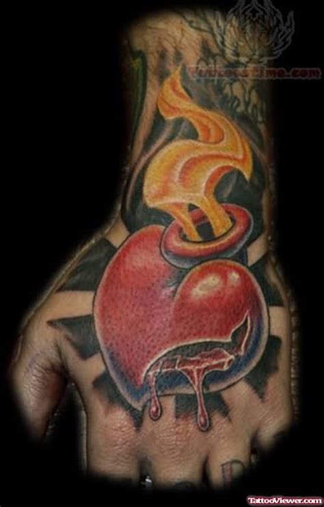 Awesome Sacred Heart Tattoo On Hand