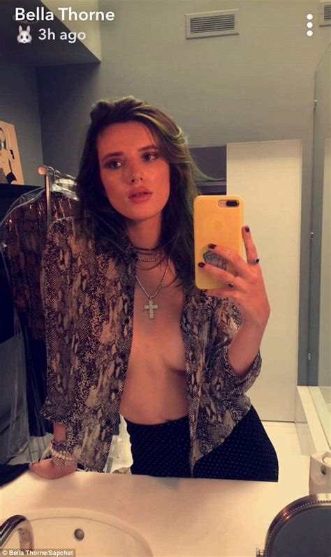 Bella Thorne Shows Off Her Unshaven Armpits As She Slips Into A Tiny
