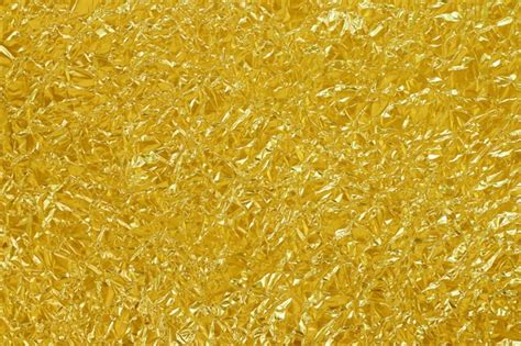 Premium Photo Gold Foil Leaf Shiny Texture Abstract Yellow Wrapping