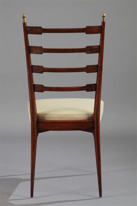The cool and unexpected standout feature this table has is the thick, chunky legs, elevating this table to the next level. Italian Dining Set, Table and 6 Mahogany Chairs For Sale at 1stdibs