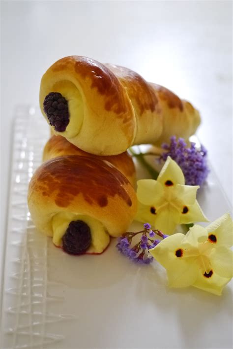 A traditional british dessert sauce made with egg yolks, sugar and milk and/or cream, flavoured with vanilla. Bread cones, filled with custard cream and fresh ...
