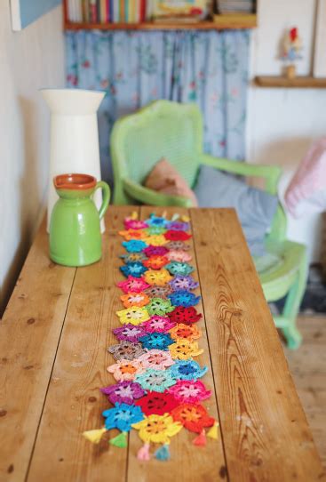 Sarah hazell's table runner is made up of three different flower patterns plus some gorgeous heart designs. Floral Table Runner | Inside Crochet | Inside Crochet ...
