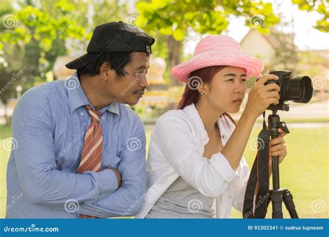 asian teen is an amateur photographer practicing photography stock image image of journey