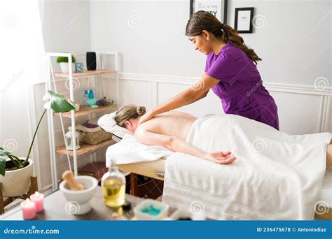 Female Masseuse Giving A Massage Stock Photo Image Of Mature Latin