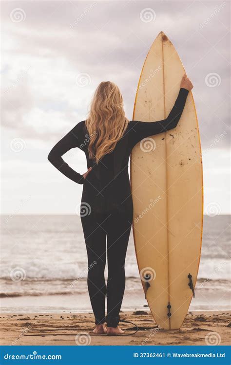 Rear View Of A Blond In Wet Suit With Surfboard At Beach Stock Image Image Of Relaxation