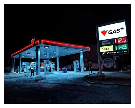 Itap Of A Gas Station At Night By Leeroym Photos