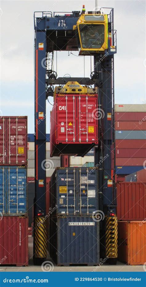 Container Reach Stacker Moving Shipping Containers Around The Storage
