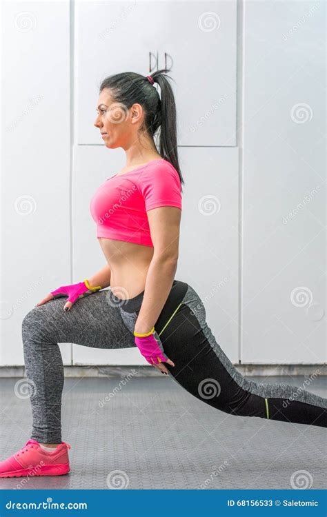 Woman Doing Leg Workout In The Gym Stock Image Image Of Stationary Athletic 68156533