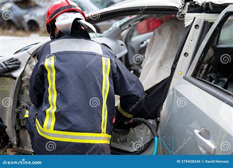 Car Crash Traffic Accident. Firefighters Rescue Injured Trapped Victims