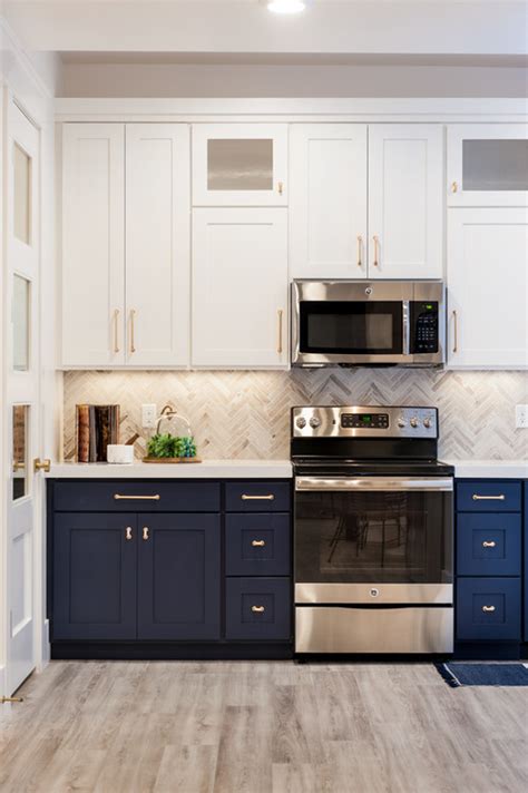 While this color is a bit unexpected in the kitchen, it's not so daring that it feels. Navy Cabinets - Popular Cabinet Color Trend • Queen Bee of ...