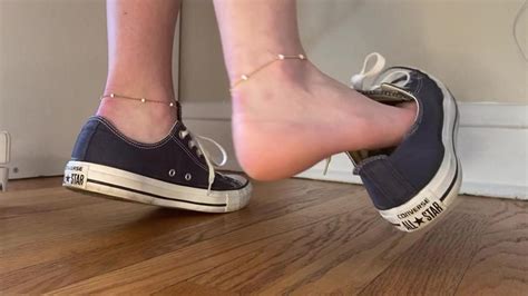 Barefoot Shoeplay And Dangling In Dirty Converse Sneakers