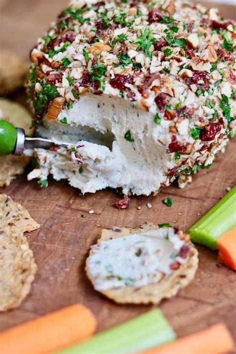 More images for amaretto cheese ball recipe » vegan cheese ball being sliced with a knife in 2020 | Easy ...