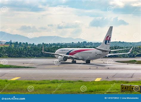 Airplane Malaysia Airline Taxiing To The Runway At Airport Editorial