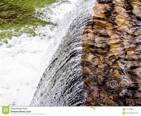White Water Rapids Waterfall Crashing To The River Floor Stock Photo