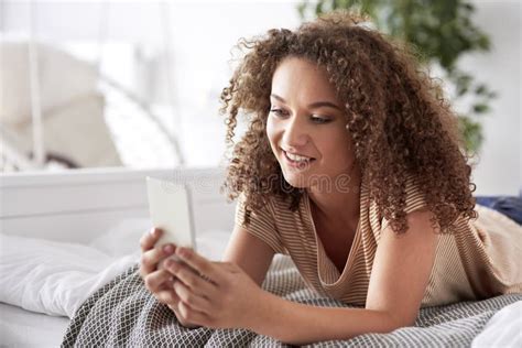 Beautiful Woman Using A Smart Phone In The Bed Stock Image Image Of Photograph Beauty 156644289