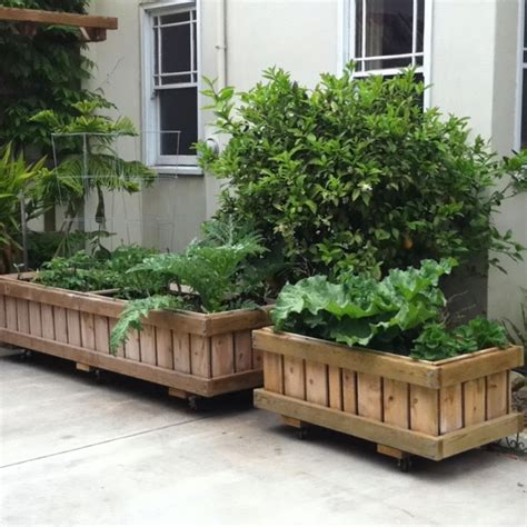 A raised garden bed (or simply raised bed) is a large planting container that sits aboveground and is filled with soil and plants. 17 Best images about Garden: planter boxes on Pinterest | Raised beds, Raised planter boxes and ...