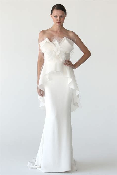 Check spelling or type a new query. Elegant ivory column wedding dress by Marchesa with peplum ...