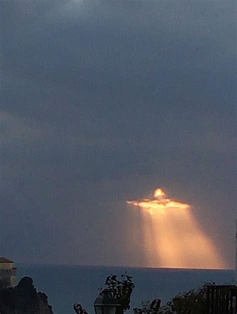 ordinary citizen captures photos of glowing angel in clouds