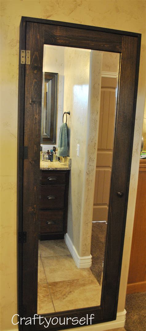 You can tackle this project in one afternoon. DIY Bathroom Cabinet with Mirror - Craft