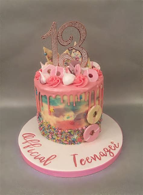 official teenager a pink chocolate buttercream drip cake with meringue kisses and p… birthday