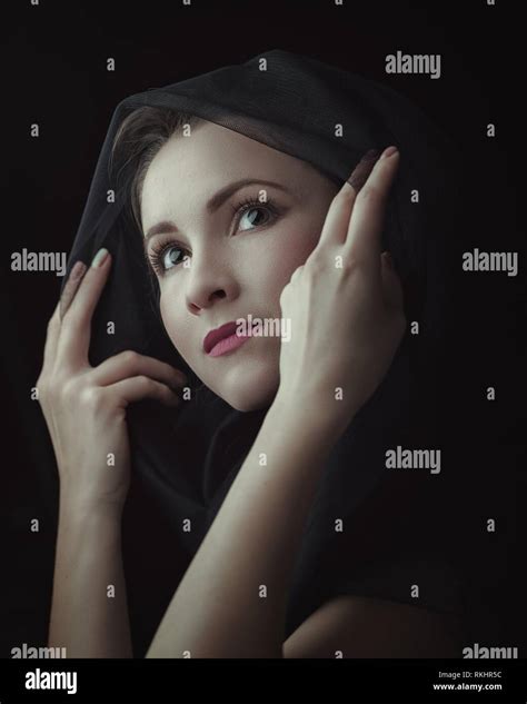 Dramatic Female Portrait Against Dark Backgrounds Stock Photo Alamy