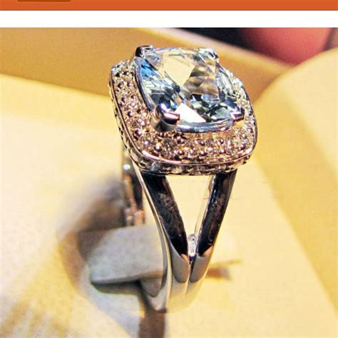 Sterling silver aquamarine studded flower ring reg. Wowza! | Aquamarine rings, Engagement rings, Engagement