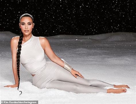 Kim Kardashian Flaunts Her In Waistline As She Poses In A Fake Winter