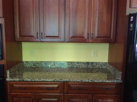 If you want to replace your kitchen floor or wall tiles without removing the cabinets, you'll need a power tool, such as an oscillating or rotary saw, that allows you to make cuts flush to the. Can I remove the short backsplash without damaging the ...