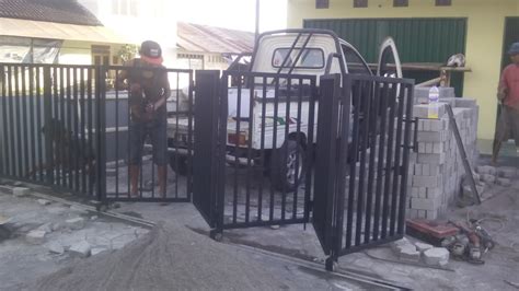 KANOPI MINIMALIS MURAH JOGJA: PAGAR PINTU LIPAT