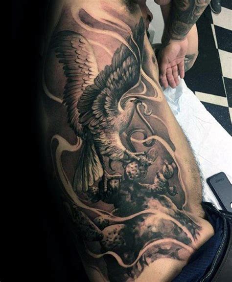 The tattoo is a little confusing as the two animals are wrapped up and the eagle's wings point in two different directions. 155+ Eagle Tattoo Design Ideas You Must Consider - Wild ...