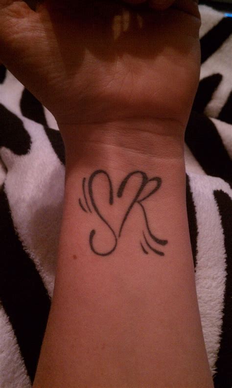 The creative process of designing a tattoo starts with thinking of where to place the tattoo and looking at other tattoos, images, and tattoo websites for inspiration. tattoo of Initials "S" and "R" for my kids, formed with a heart | Inkling | Pinterest | Tattoo ...