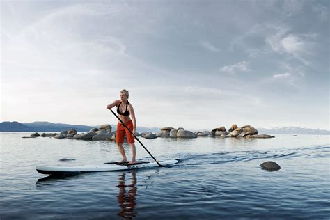 Rod Mclean Photographyfemale Athlete Paddle Boarding On Lake Tahoe By