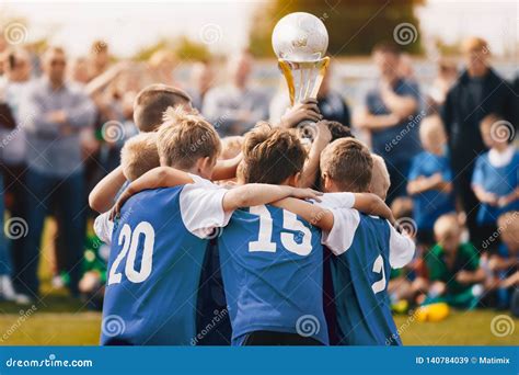 Boys Champion Sport Team Kids Holding Winner Golden Cup Children