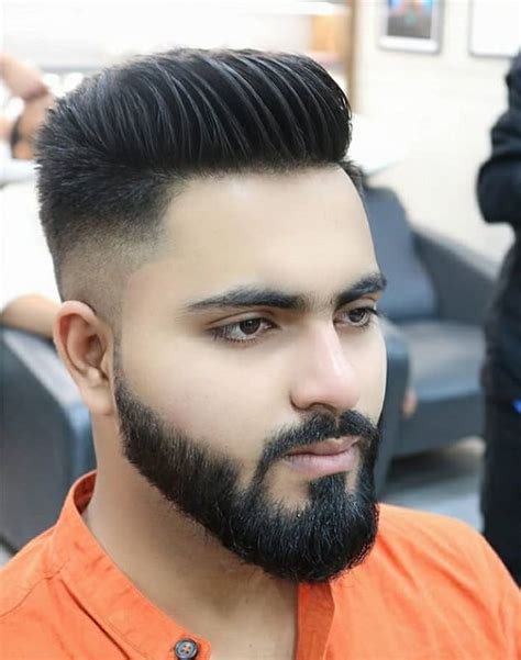 The slicked back style also works perfectly if your hair is thinning. 20 Devastatingly Cool Haircuts for Men With Thick Hair