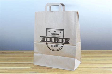 Download Paper Shopping Bag on Desk Mockup - Mediamodifier - Online ...