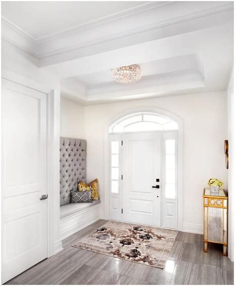 Coat hooks put unused wall space to work in small entryways. 10 Chic Seating Options for Creating a Welcoming Entryway